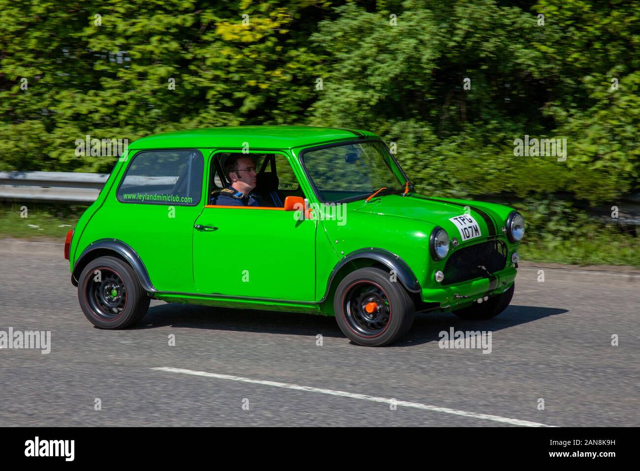 1973 70s seventies Green Morris Mini 1000, Petrol 998 cc classic cars, veteran and heritage, cherished oldtimers en-route to Pendle Power Fest, Motor show in Lancashire, UK Stock Photo