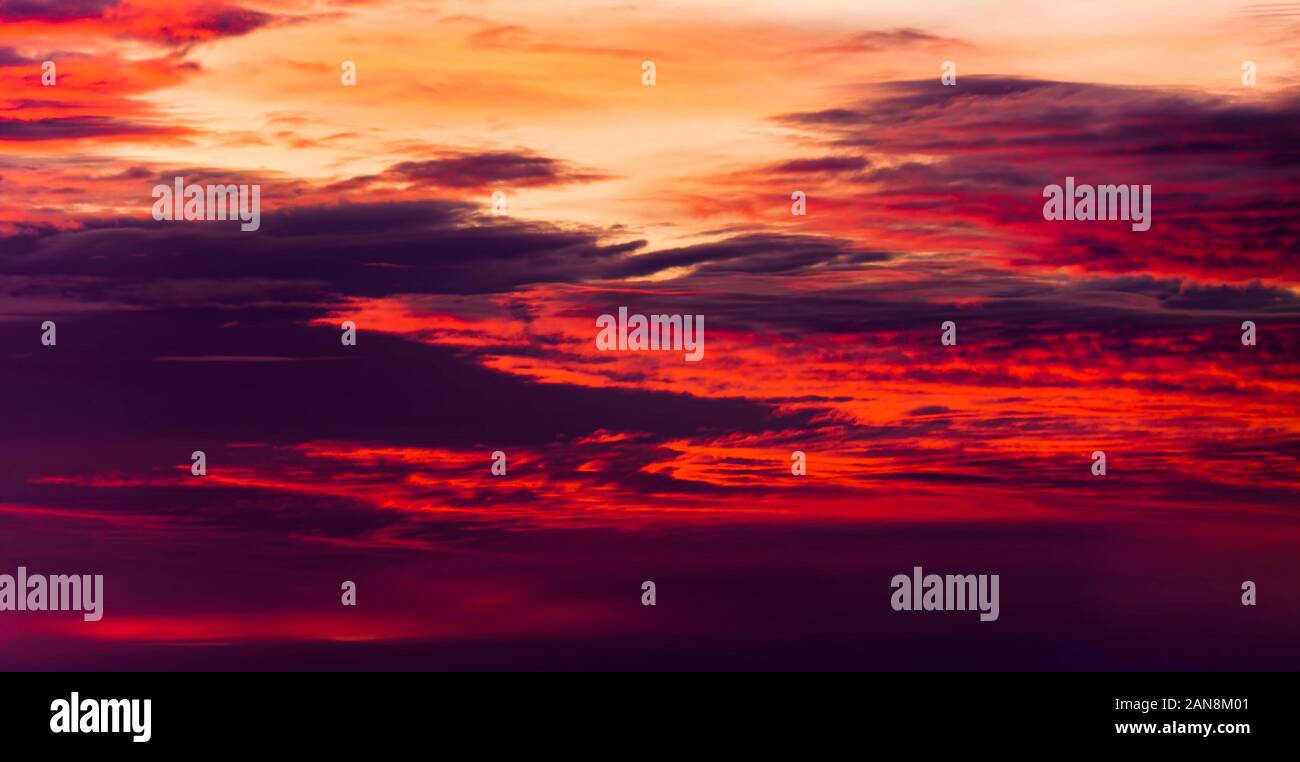 sunset sky with red clouds Stock Photo - Alamy