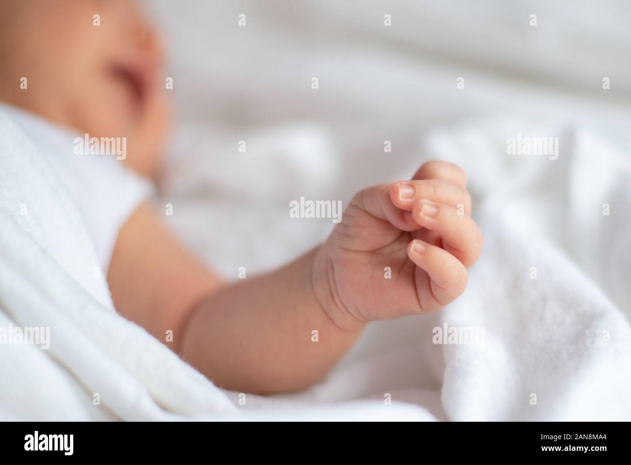 Closeup of an newborn hand when he is on bed Stock Photo Alamy
