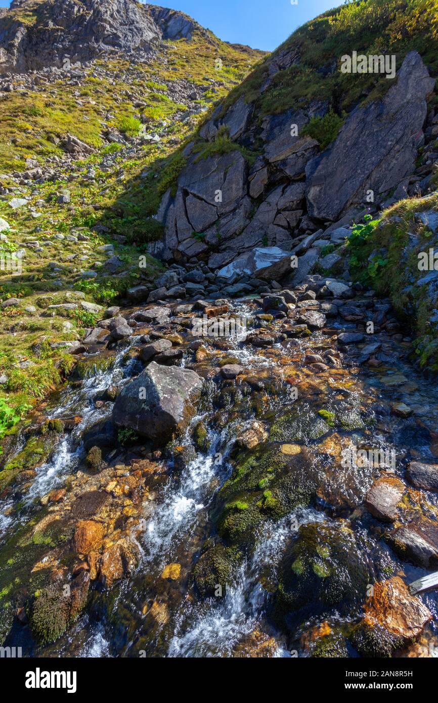 The source  of the Mur (Mura) River in Austrian Alps Stock Photo