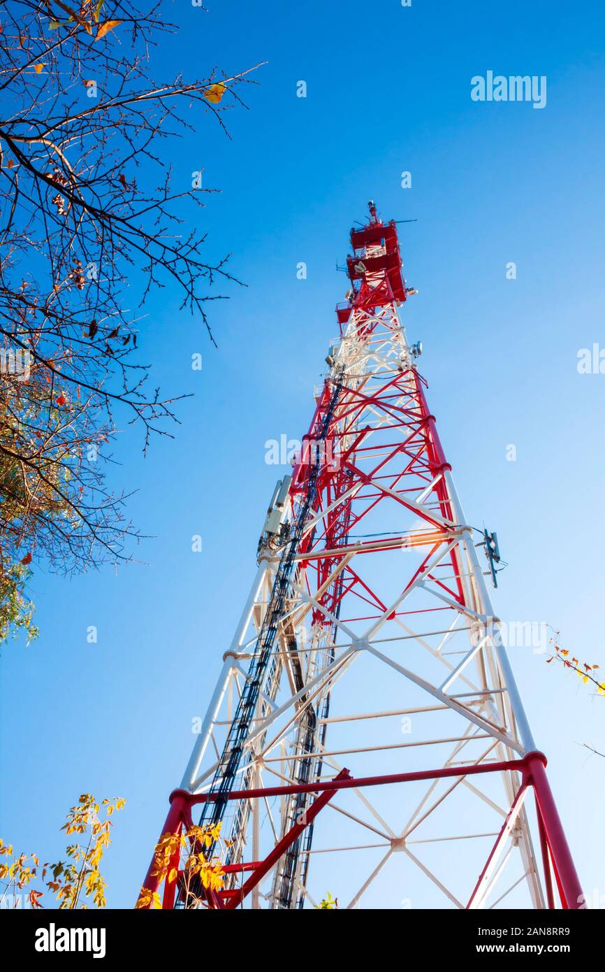 Tower of radar station on blue sky background. Bottom view Stock Photo ...