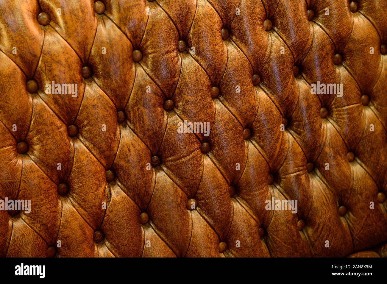 Vintage brown leather sofa background Stock Photo