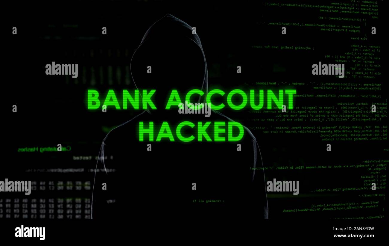 Evil genius man hacked bank account, illegal funds transfer, money laundering Stock Photo