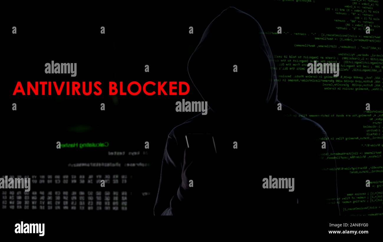 Dark hood man blocked antivirus, infecting computer system, cyber ...