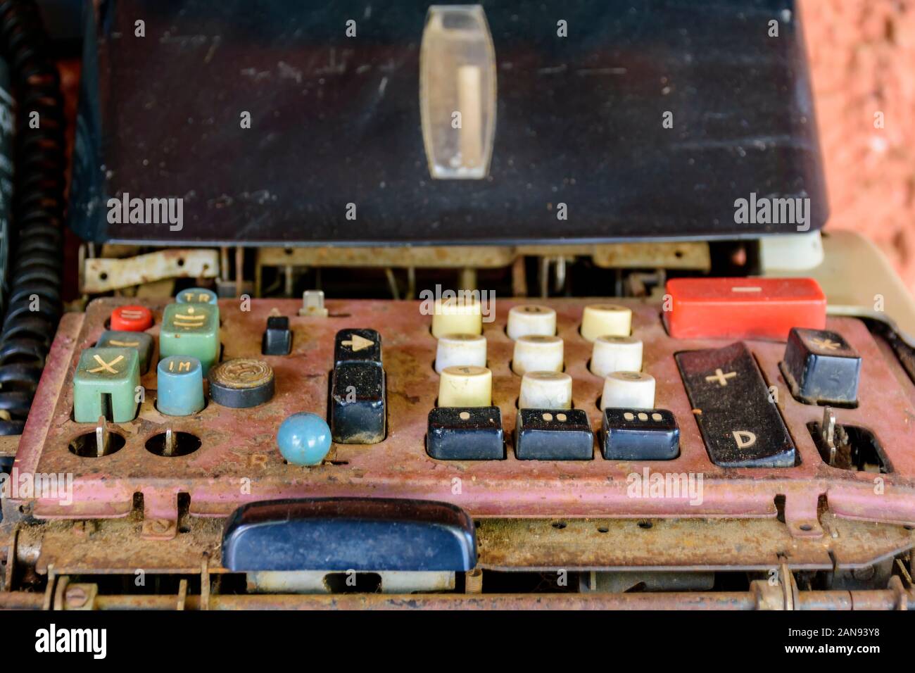 Decrepit Machine Old, rusty and damaged mechanical calculating machine left in the ...