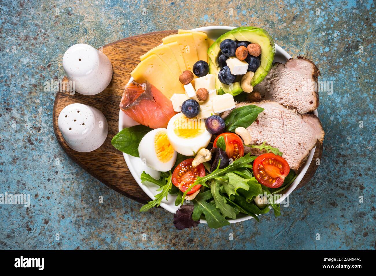 Keto diet plate on white table. Stock Photo