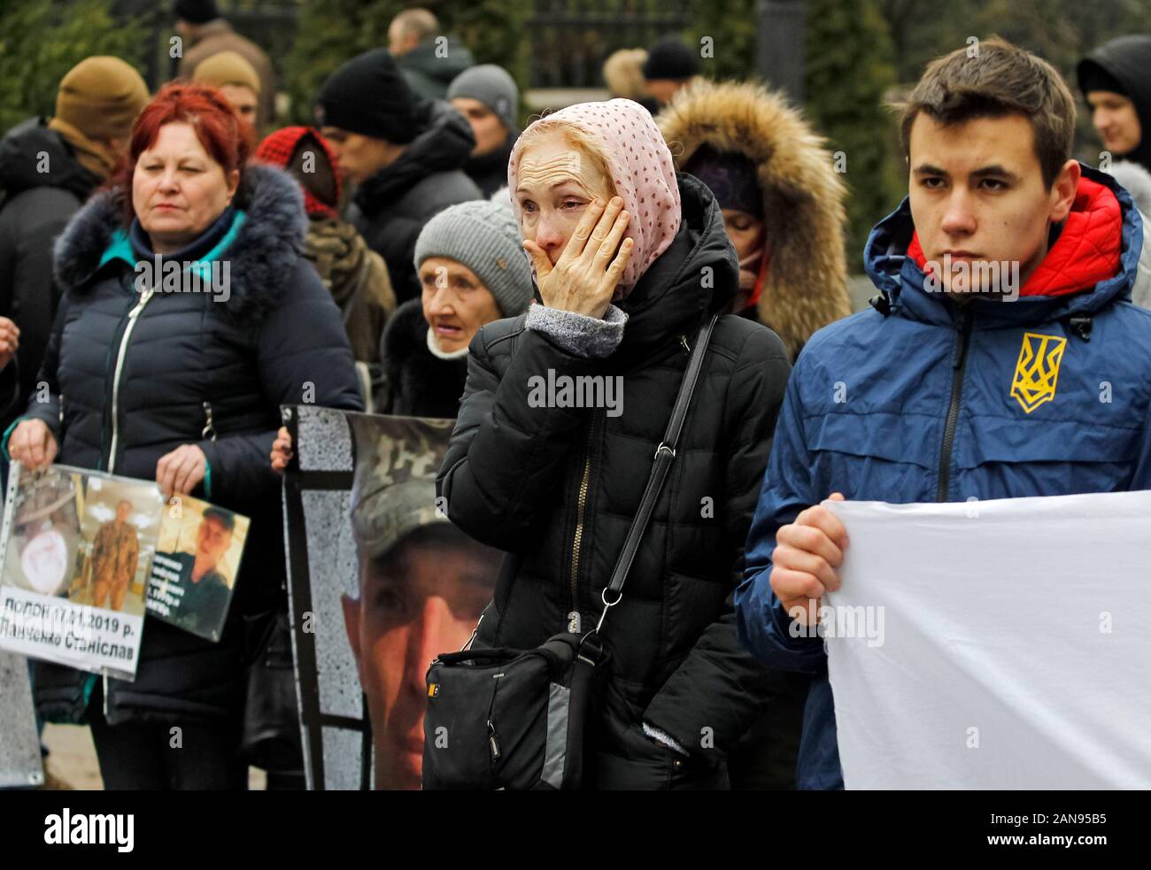 A woman reacts during the rally in support of Ukrainian prisoners outside the Presidential Office in Kiev.Ukraine swaps prisoners with pro-Russian separatists in attempt to end war. According to the President of Ukraine official site, during phone talk the President of Ukraine Volodymyr Zelensky and President of Russia Vladimir Putin agreed to proceed with the approval of new lists for the release of Ukrainians, including Crimeans from Crimea and Russia, and Russians held in Ukraine. Stock Photo