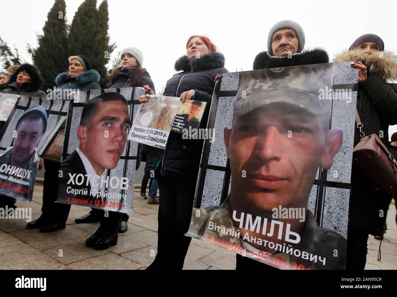Relatives and friends hold portraits of Ukrainian civilian prisoners and prisoners of war (POW) during the rally in support of Ukrainian prisoners outside the Presidential Office in Kiev.Ukraine swaps prisoners with pro-Russian separatists in attempt to end war. According to the President of Ukraine official site, during phone talk the President of Ukraine Volodymyr Zelensky and President of Russia Vladimir Putin agreed to proceed with the approval of new lists for the release of Ukrainians, including Crimeans from Crimea and Russia, and Russians held in Ukraine. Stock Photo