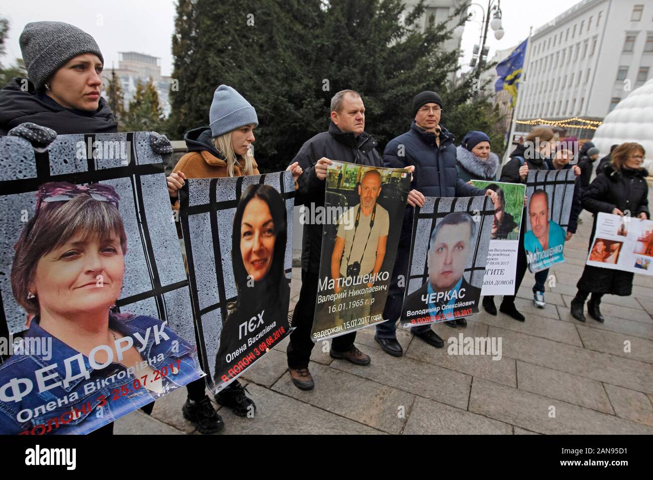 Relatives and friends hold portraits of Ukrainian civilian prisoners and prisoners of war (POW) during the rally in support of Ukrainian prisoners outside the Presidential Office in Kiev.Ukraine swaps prisoners with pro-Russian separatists in attempt to end war. According to the President of Ukraine official site, during phone talk the President of Ukraine Volodymyr Zelensky and President of Russia Vladimir Putin agreed to proceed with the approval of new lists for the release of Ukrainians, including Crimeans from Crimea and Russia, and Russians held in Ukraine. Stock Photo