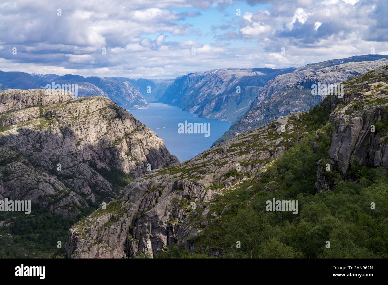 Hiking road to cliff Preikestolen in fjord Lysefjord - Norway - nature and travel background Stock Photo
