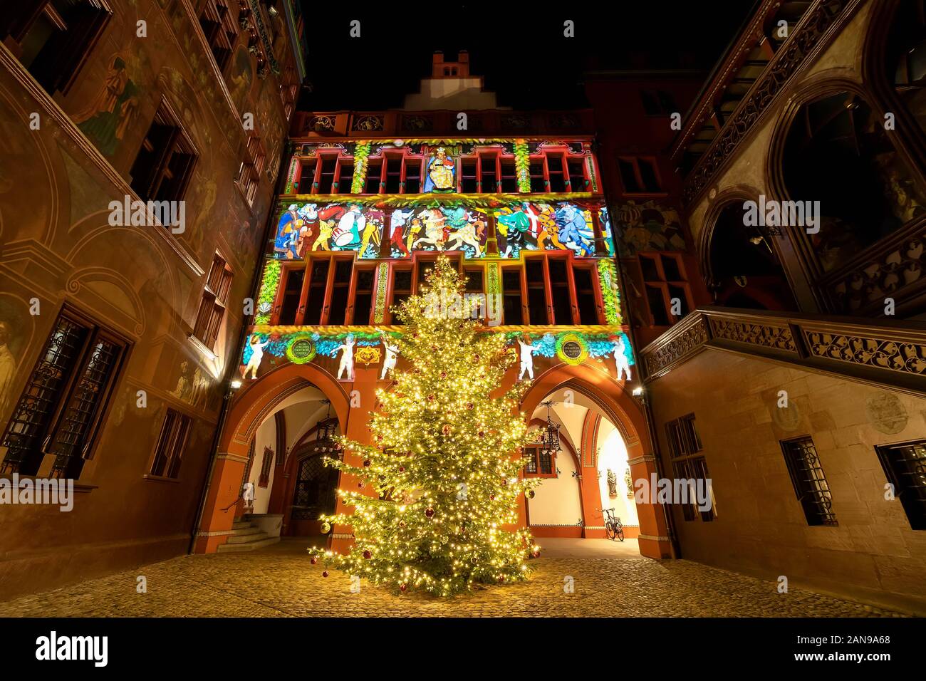 Basel, Swizerland - December 3,2019: Christmas tree at town hall of Basel, a five hundred years old building dominating the Marktplatz in Basel, Switz Stock Photo