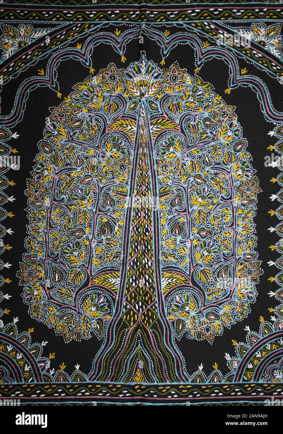Rogan Art practiced in the Kutch District of Gujarat, India. Paint made from castor oil and vegetable dyes is applied to cloth using a stylus Stock Photo