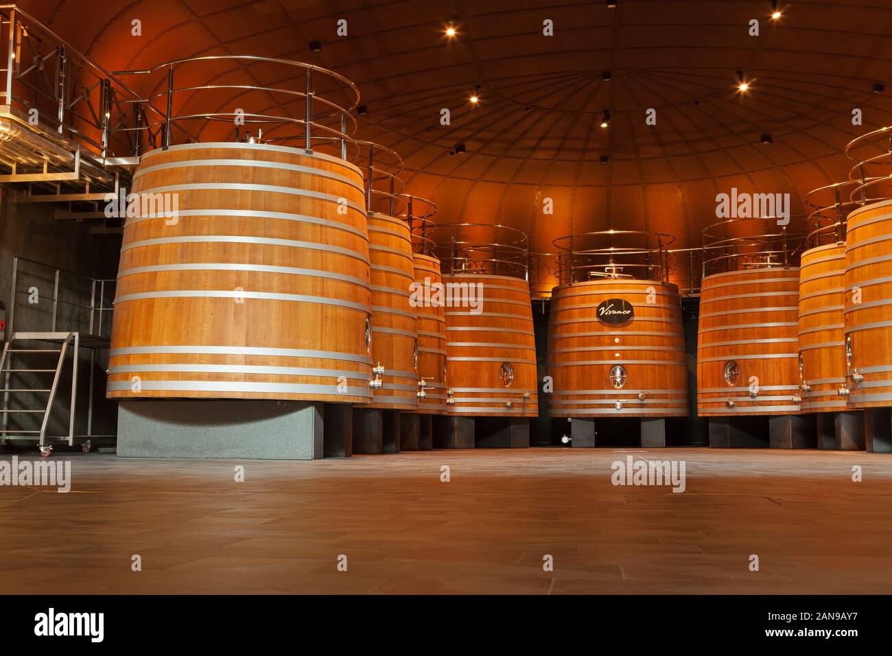 Wine fermentation barrels in a Rioja winery near Briones Stock Photo