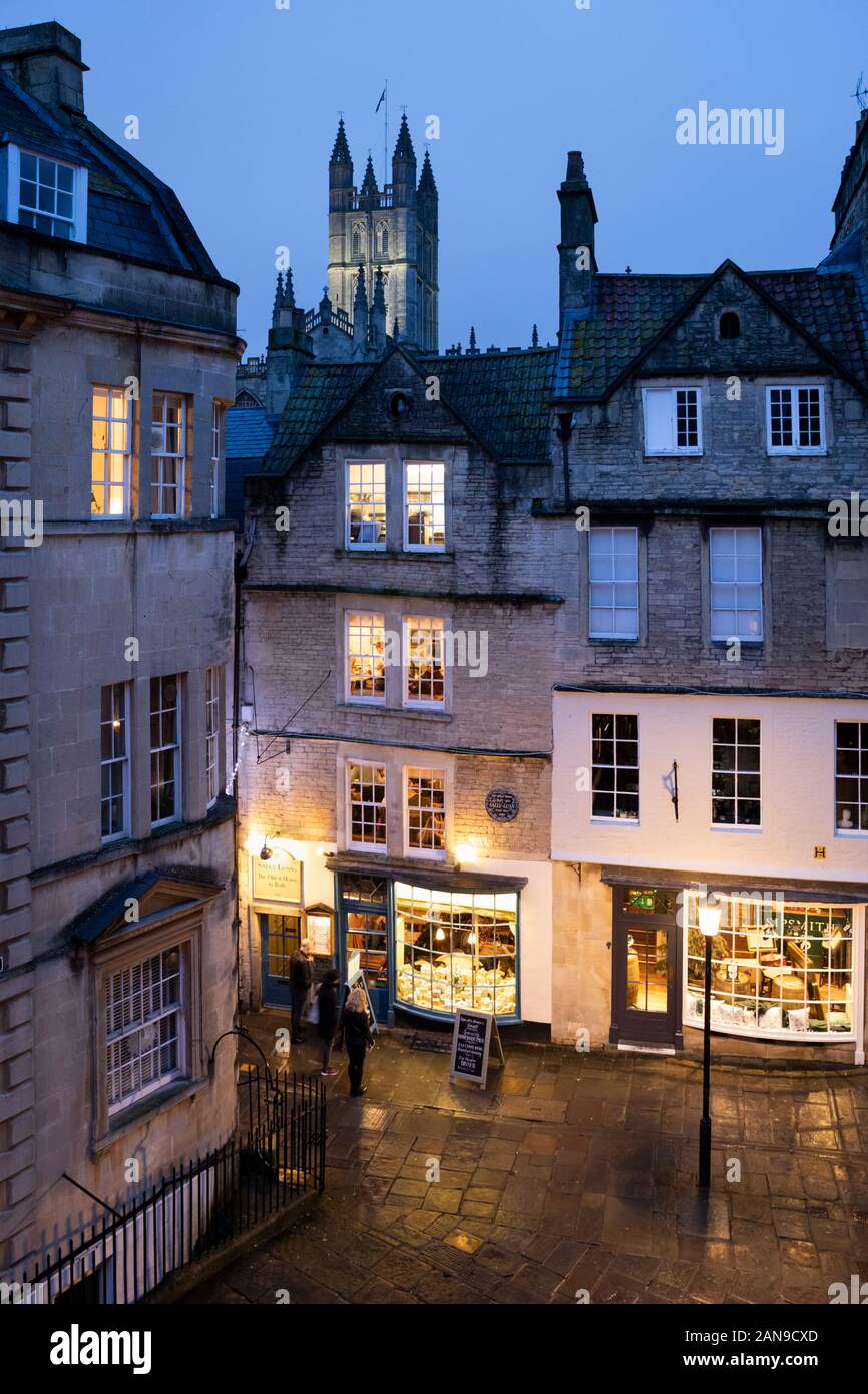 Sally Lunn's historic eating house and museum with Bath Abbey floodlit in evening, Bath, Somerset, England, United Kingdom, Europe Stock Photo