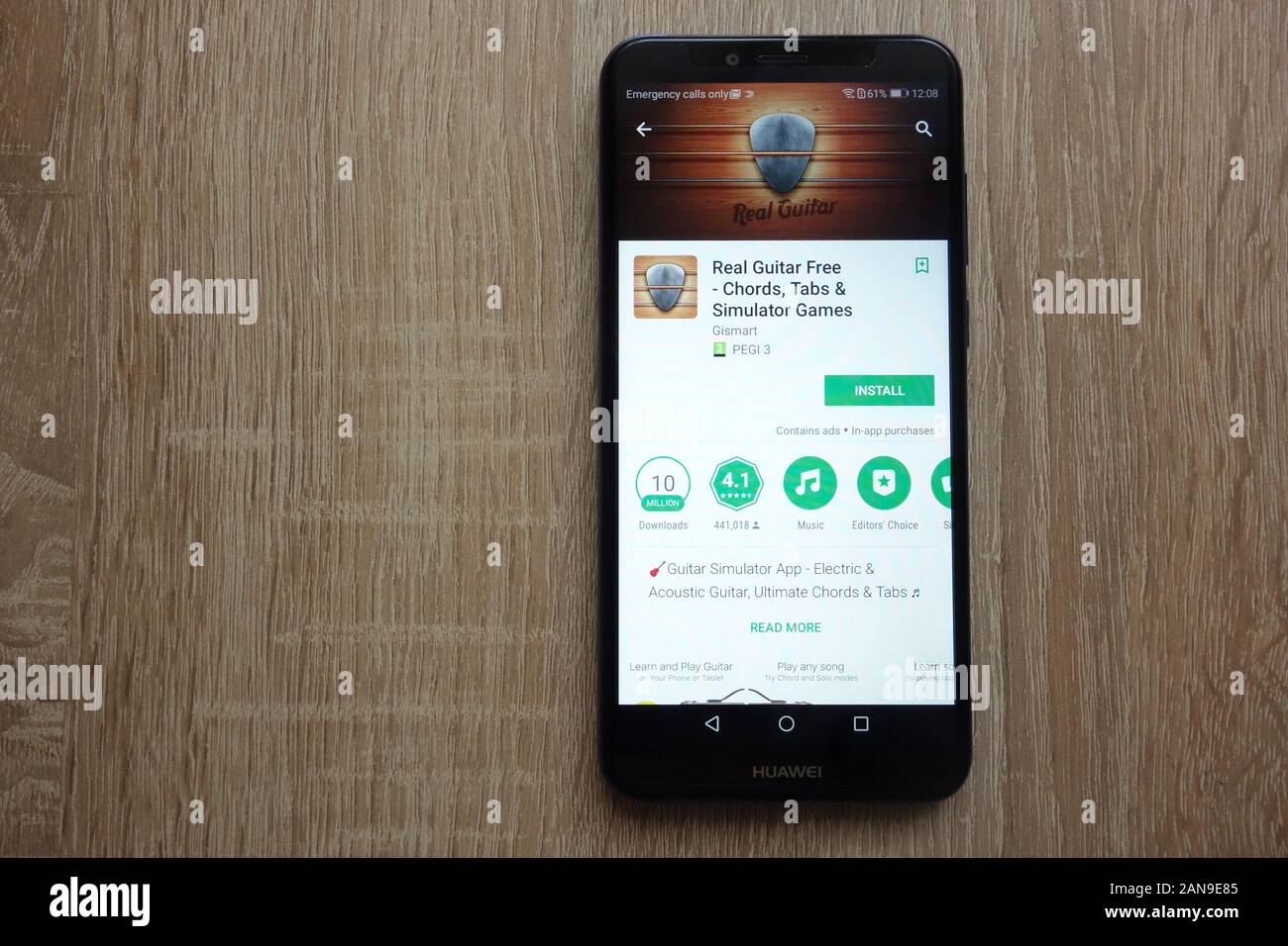 Real Guitar app on Google Play Store website displayed on Huawei Y6 ...