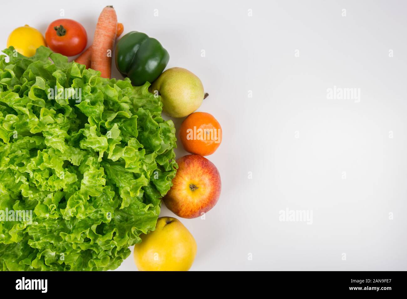 Healthy bio food on the table with copy space. Close up organic fruits ...