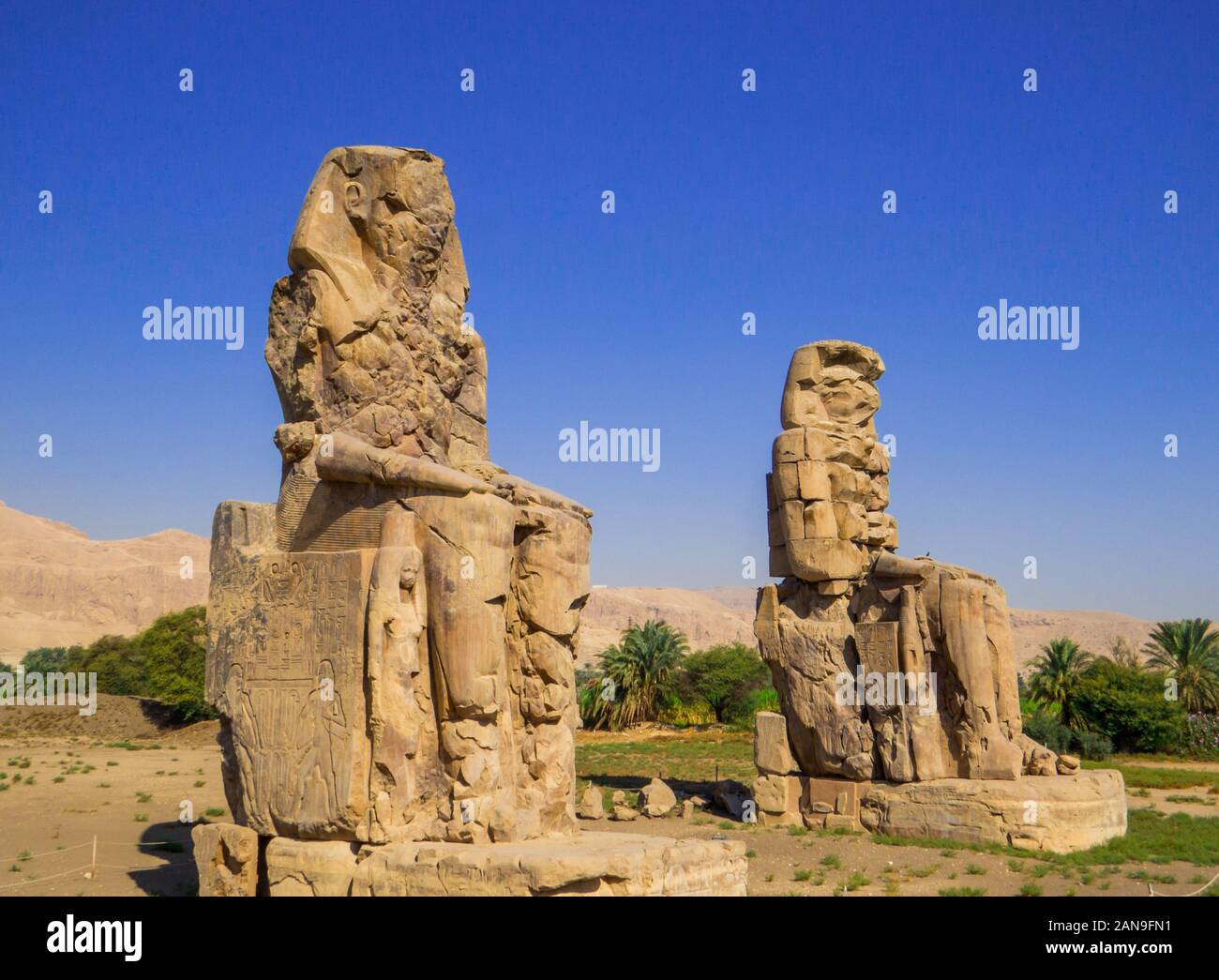 colossi-of-memnon-mortuary-temple-of-amenhotep-iii-luxor-egypt-stock