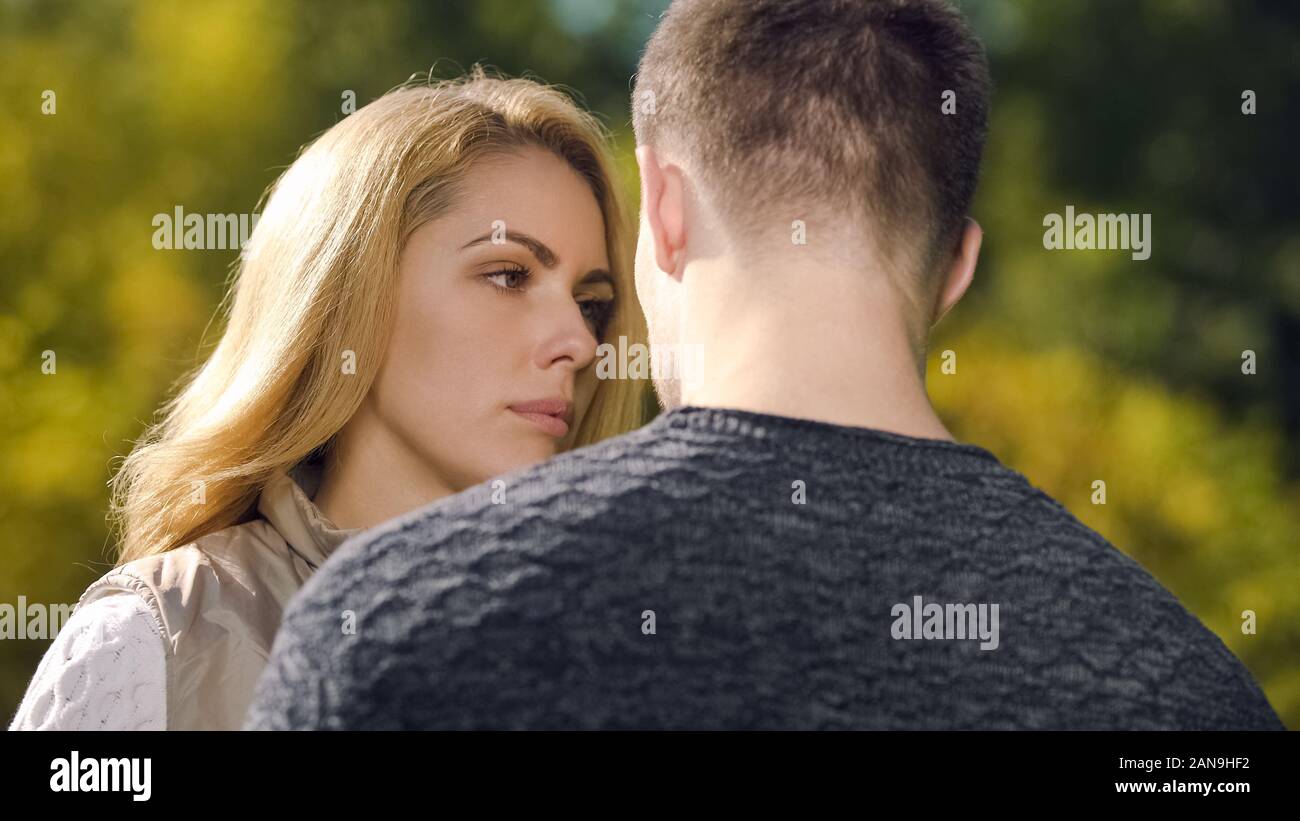 Husband looking after woman hi-res stock photography and images - Alamy