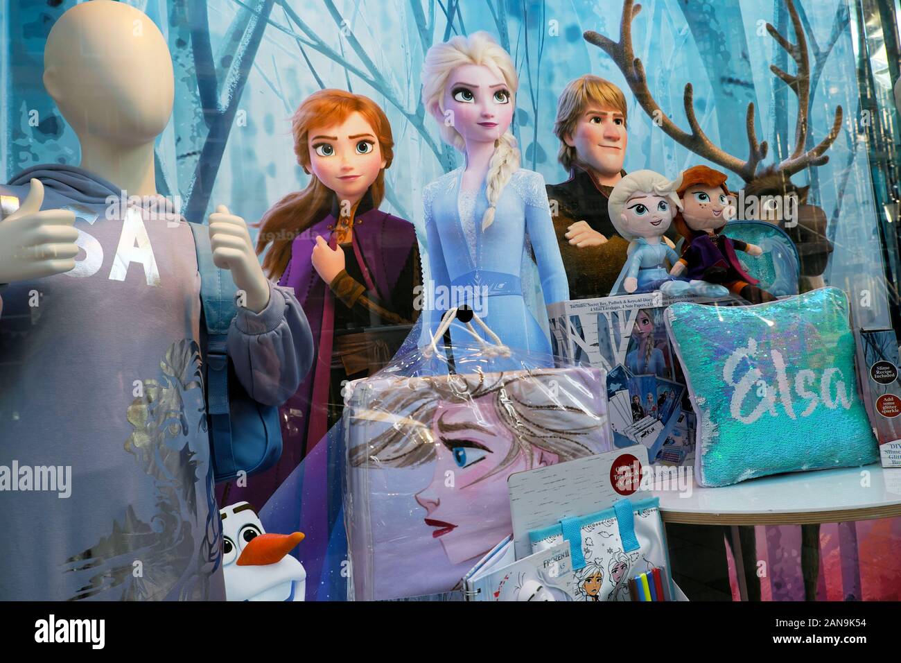 Disney characters from the film 'Frozen' in a department store window with merchandise products toys at Christmas time London England UK  KATHY DEWITT Stock Photo