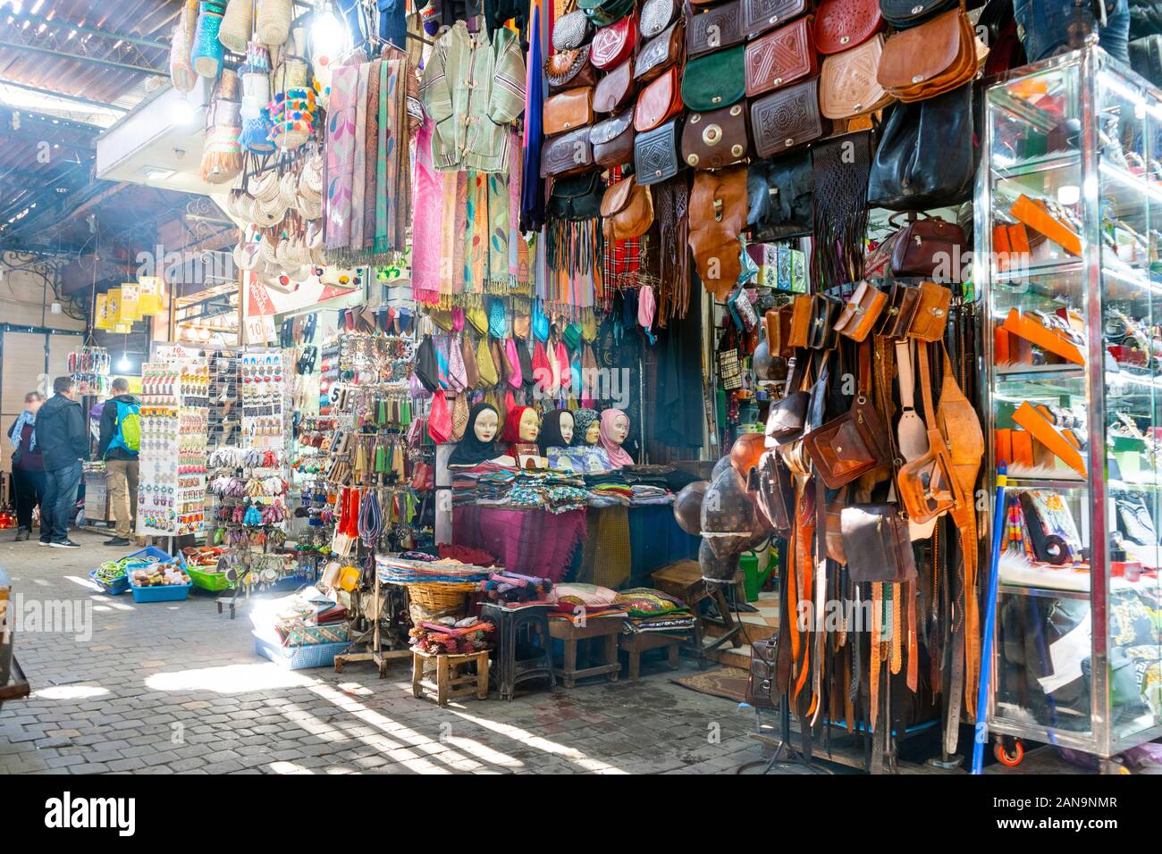 Market with leather bags and belts in medina of Marrakech, Morroco Stock Photo