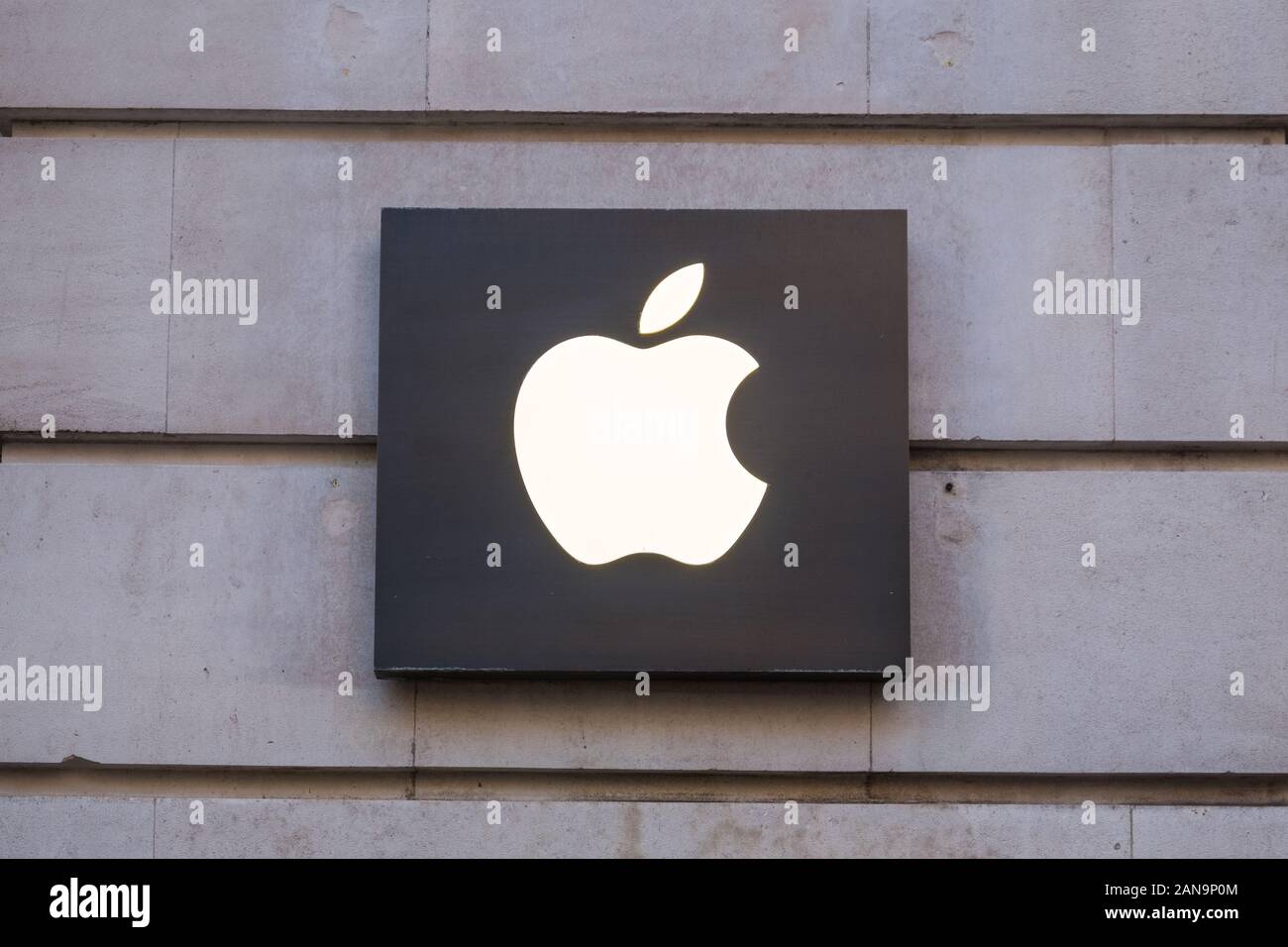 The Apple logo on a plaque outside the large Apple Store in New Street, Birmingham, West Midlands,UK Stock Photo