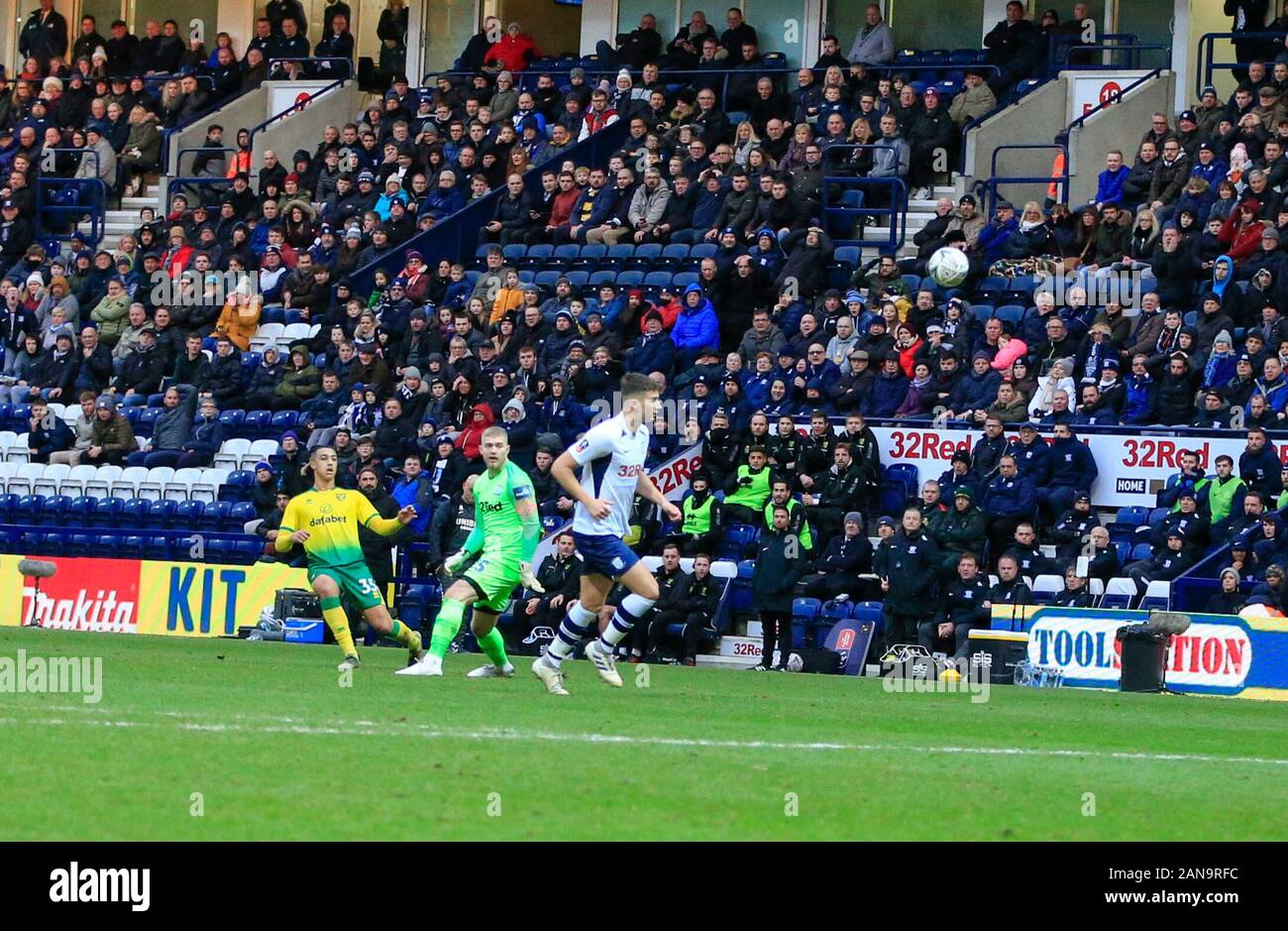 4th January 2020, Deepdale, Preston, England; Emirates FA Cup, Preston North End v Norwich City : Adam Idah (35) of Norwich City lobs the ball into the net for Norwich’s third goal in the 38th minute with Connor Ripley (25) of Preston North End well out of his area Credit: Conor Molloy/News Images Stock Photo
