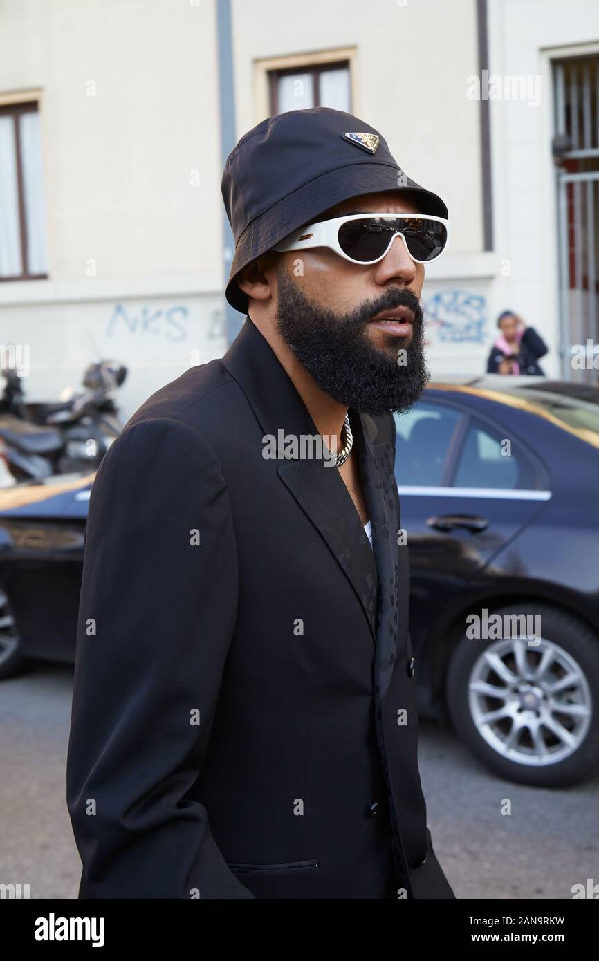 MILAN, ITALY - JANUARY 12, 2019: Man with black Prada hat and white  sunglasses before Msgm fashion show, Milan Fashion Week street style Stock  Photo - Alamy