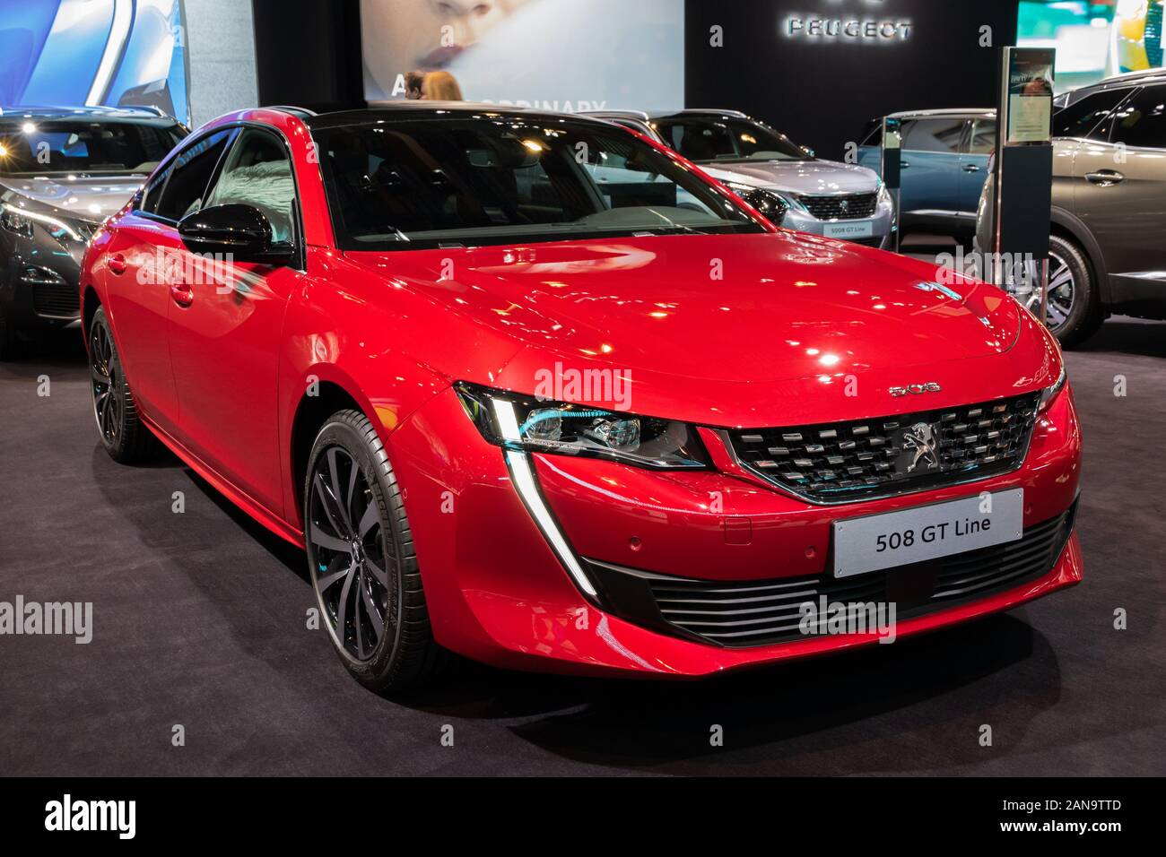 BRUSSELS - JAN 9, 2020: New 2020 Peugeot 508 GT Fastback car model model presented at the Brussels Autosalon 2020 Motor Show. Stock Photo