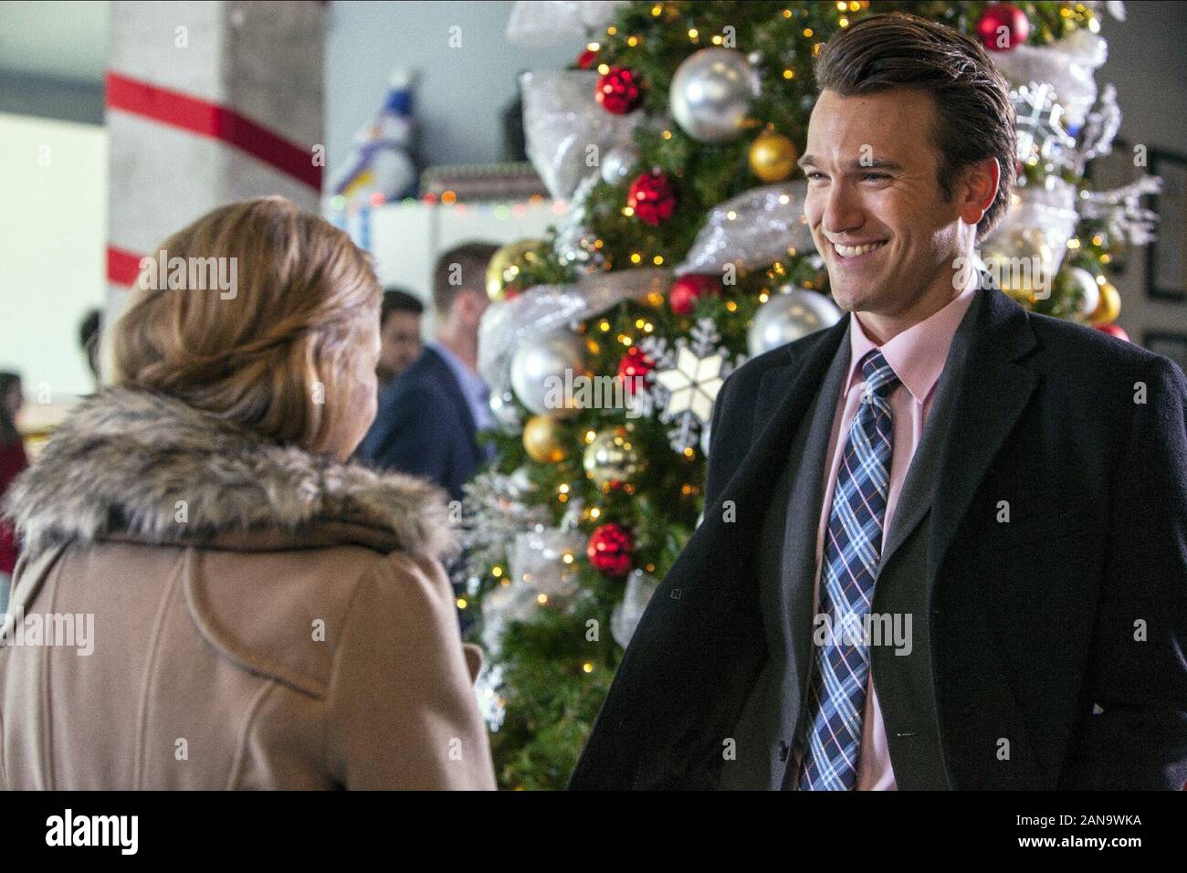 ELISABETH HARNOIS, ADAM MAYFIELD, A CHRISTMAS KISS II, 2014 Stock Photo -  Alamy