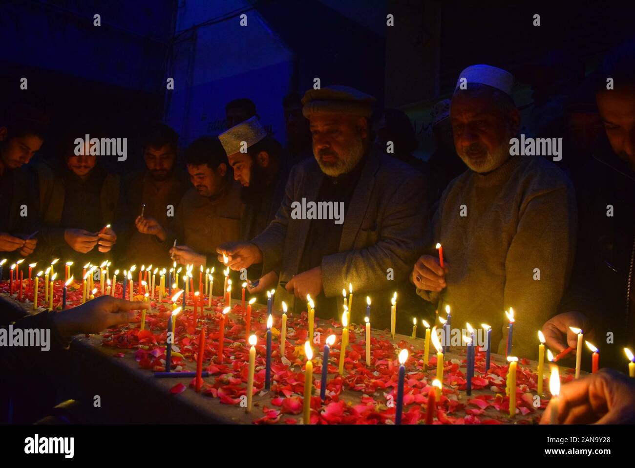 Peshawar, Pakistan. 16th Jan, 2020. Pakistan civil society members holding a candle vigil for those killed in Neelum valley avalanche tragedy. (Photo by Hussain Ali/Pacific Press) Credit: Pacific Press Agency/Alamy Live News Stock Photo