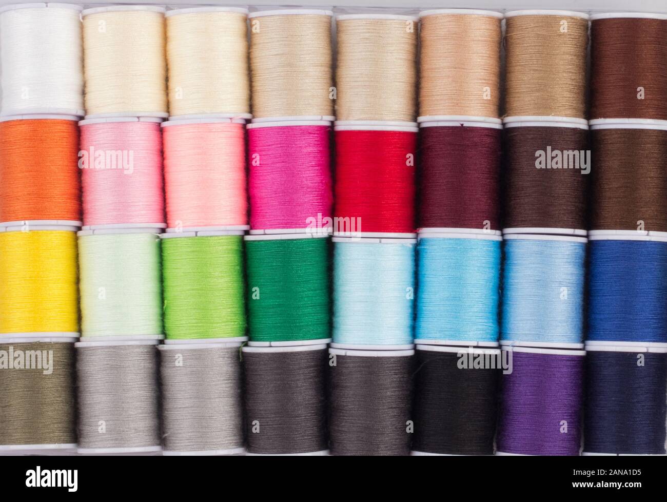 close up of colorful cone of threads, sewing tool Stock Photo Alamy