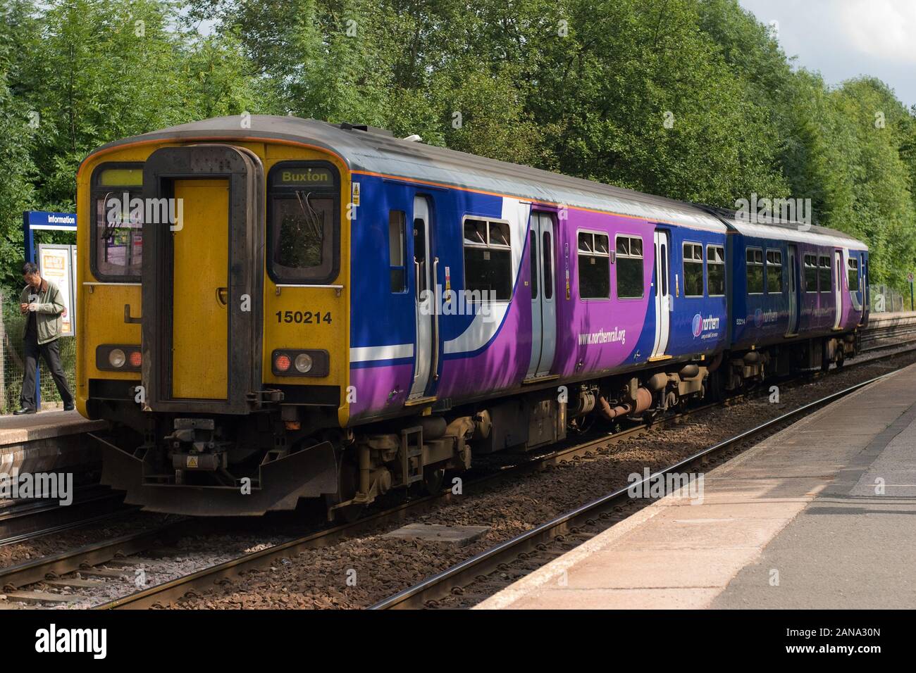 Class 150 unit on a Manchester to Buxton train waits at Furness Vale station. Stock Photo