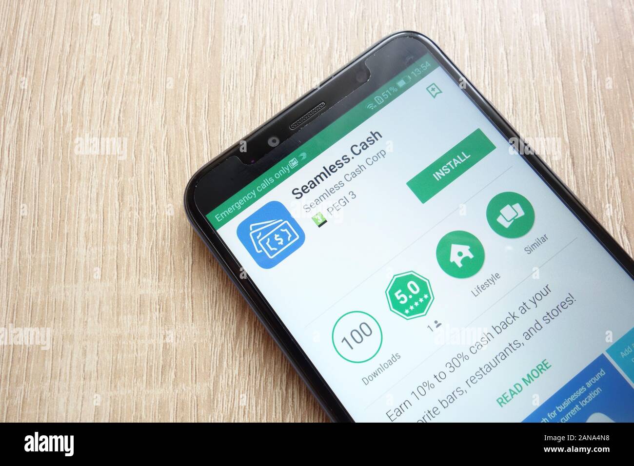 Seamless.Cash app on Google Play Store website displayed on Huawei Y6 2018 smartphone Stock Photo