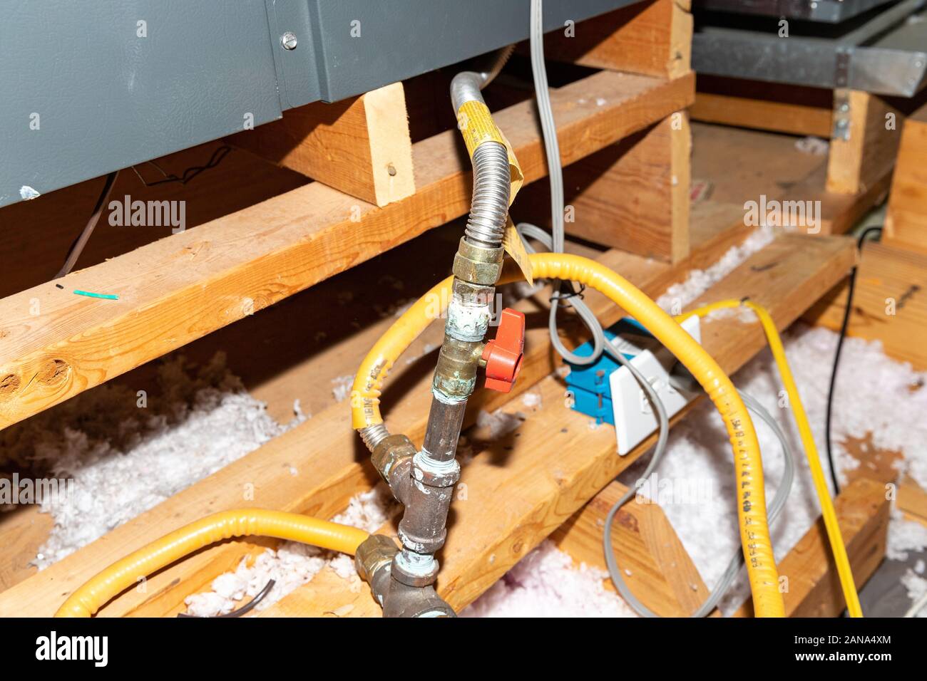 Natural Gas safety shut off valave in attic of a home Stock Photo
