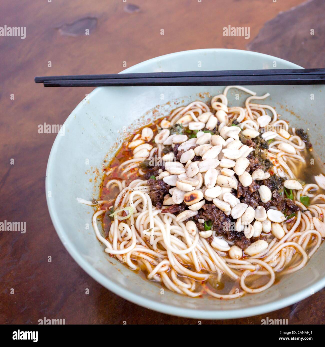 Sichuan style noodles like spicy noodle with chicken gizzard, minced