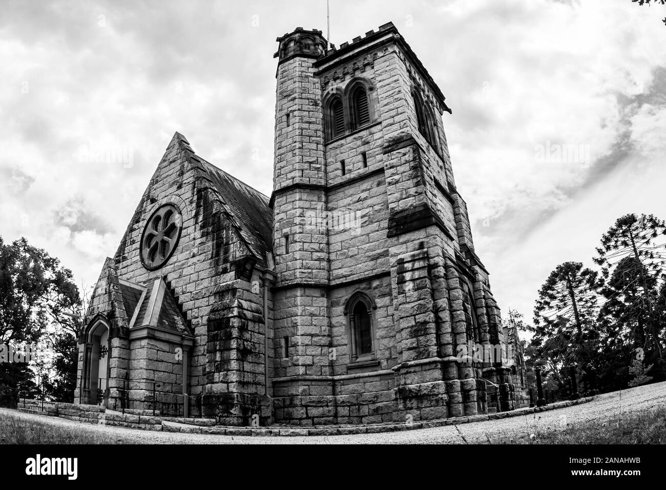Old stone ancient Catholic Church in Australia. Black and white image ...