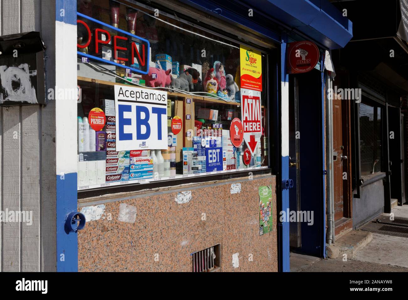 Philadelphia, PA, USA - January 15, 2020: A small independent convenience store advertises that EBT cards, also known as food stamps, are accepted. Stock Photo