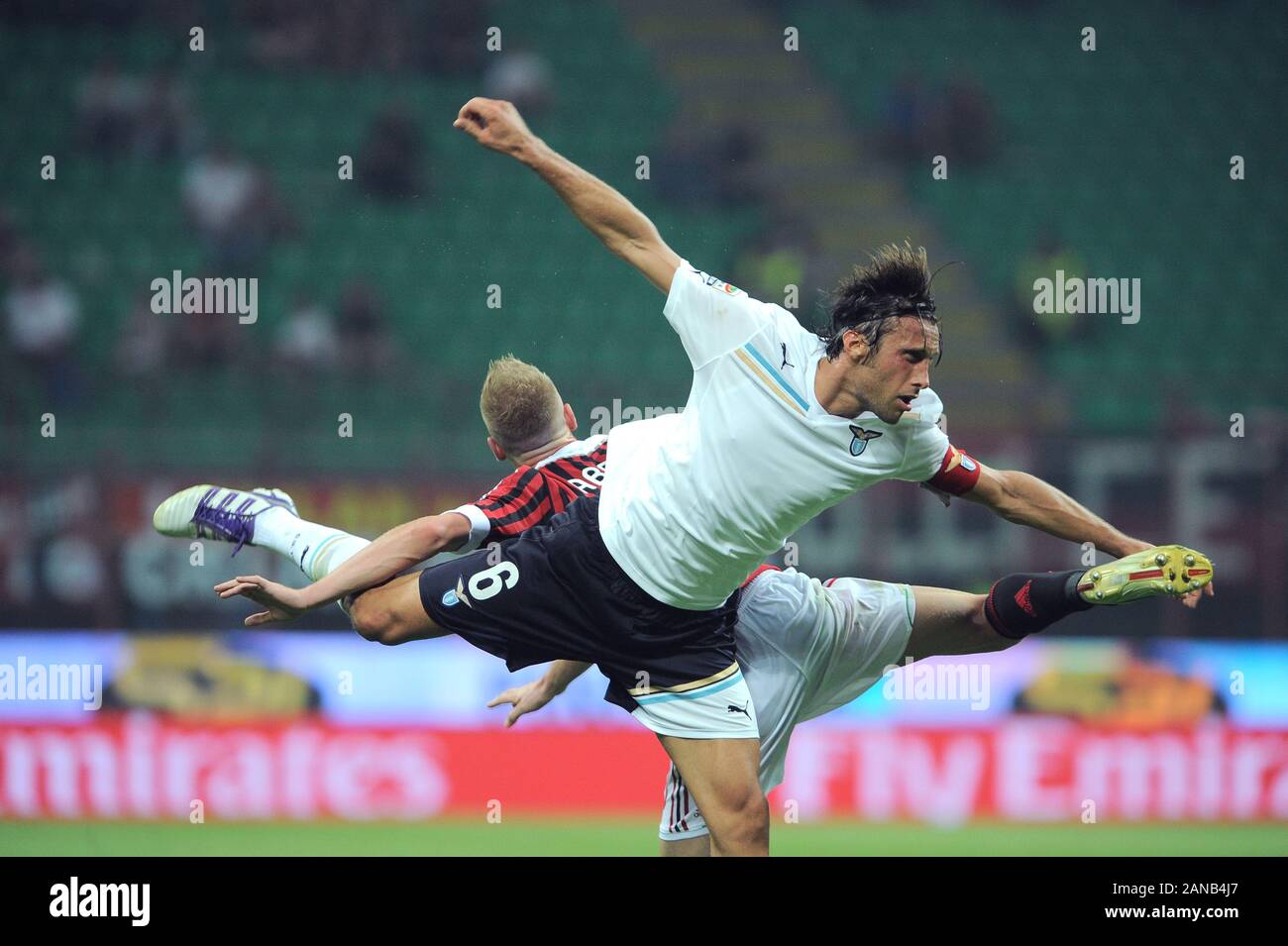 Milan  Italy, 09 September 2011, ' SAN SIRO ' Stadium, Serious Football Championship A 2011/2012,   AC Milan - SS Lazio : Stefano Mauri and Ignazio Abate in action during the match Stock Photo