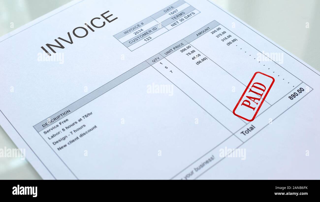 Paid seal stamped on invoice document, business bills, accountancy