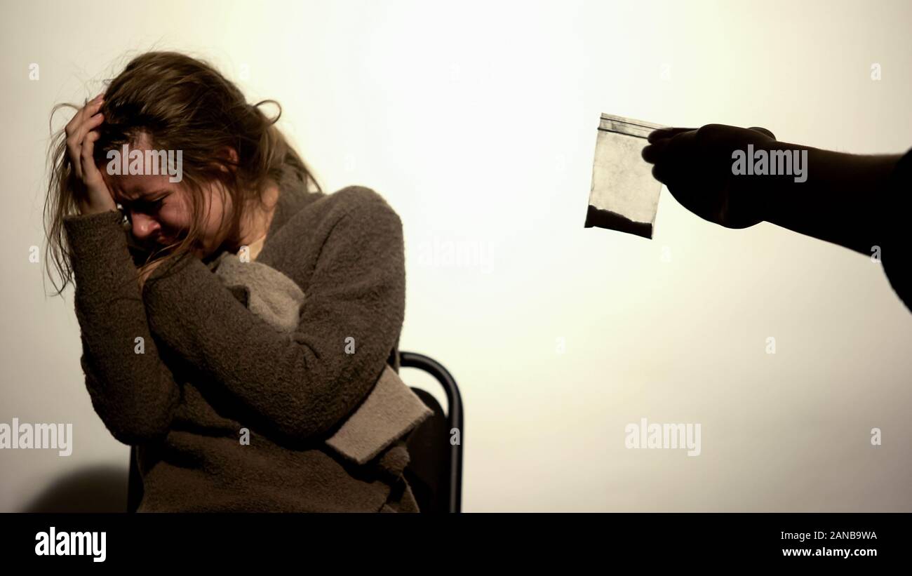 Male offering cocaine addicted woman, drug withdrawal, psychological  dependence Stock Photo - Alamy, image size:1300x821
