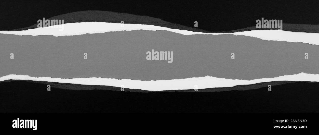 Ripped paper on grey background, space for copy Stock Photo - Alamy