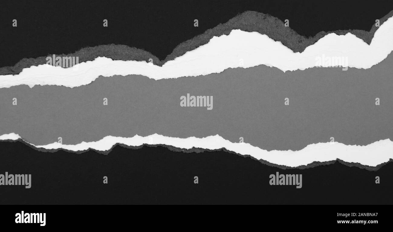Ripped paper on grey background, space for copy Stock Photo - Alamy