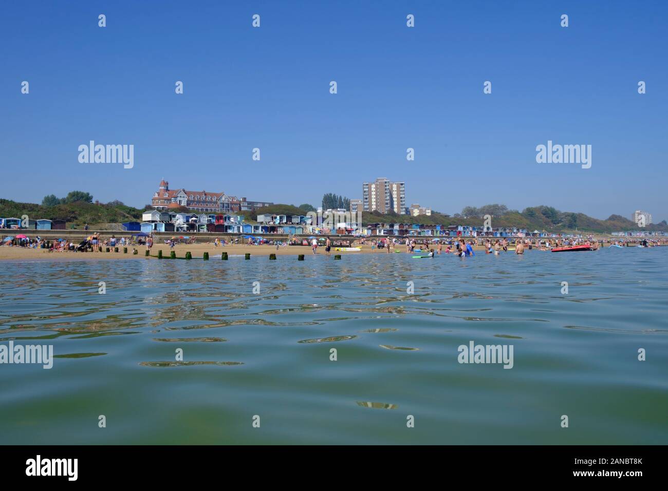 The beach and seaside at Frinton-on-Sea during a hot British summer's day Stock Photo