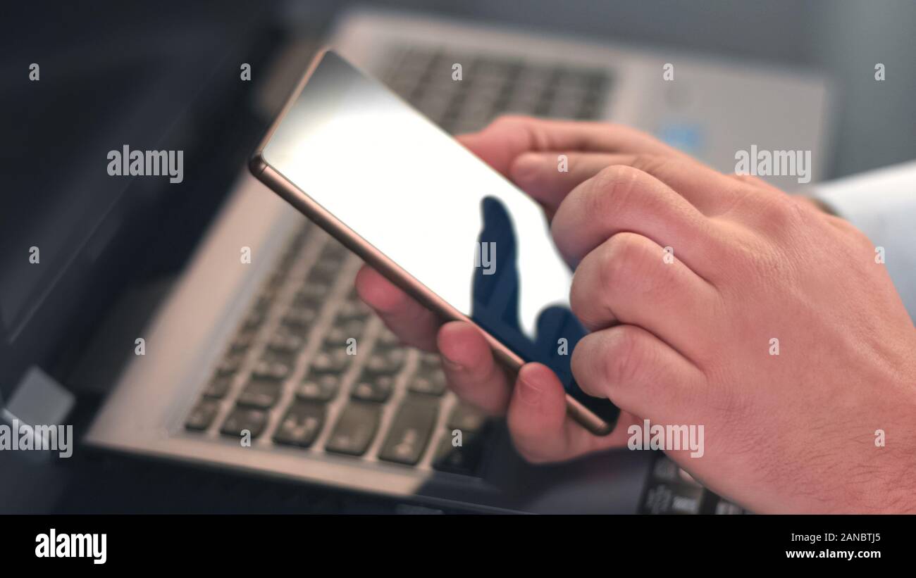 Closeup male hands scrolling typing hi-res stock photography and images ...