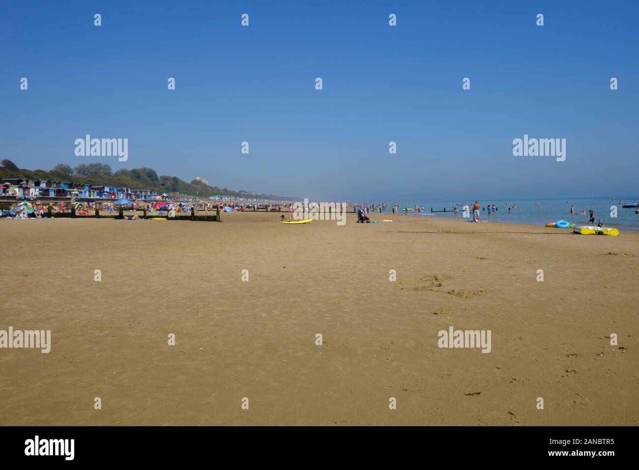 The beach and seaside at Frinton-on-Sea during a hot British summer's day Stock Photo