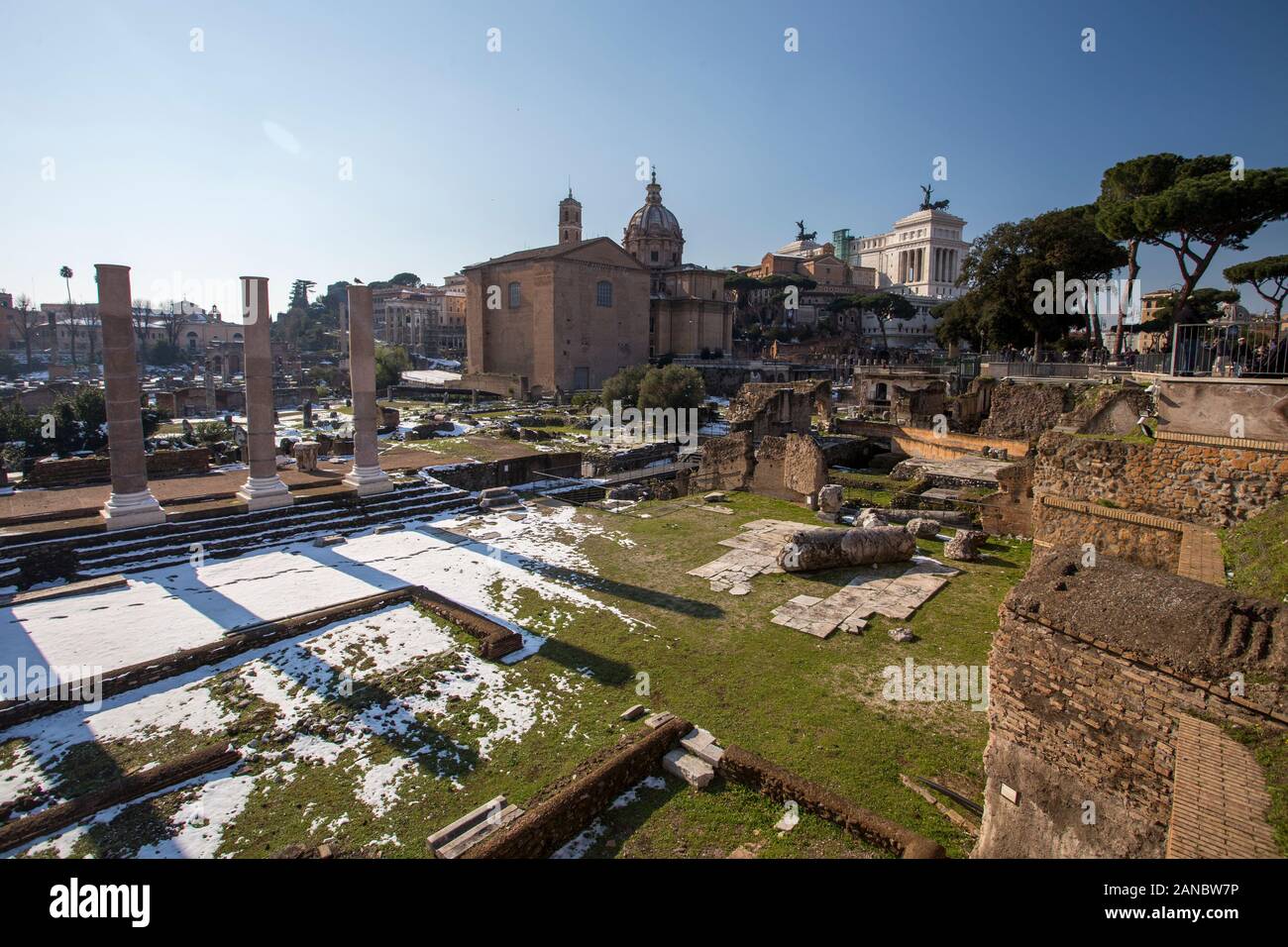 Rome, Italy, February 2018 - Snow covered Rome, winter tourism in capital city of Italy, famous travel destination in winter. Forum Romanum with snow. Stock Photo