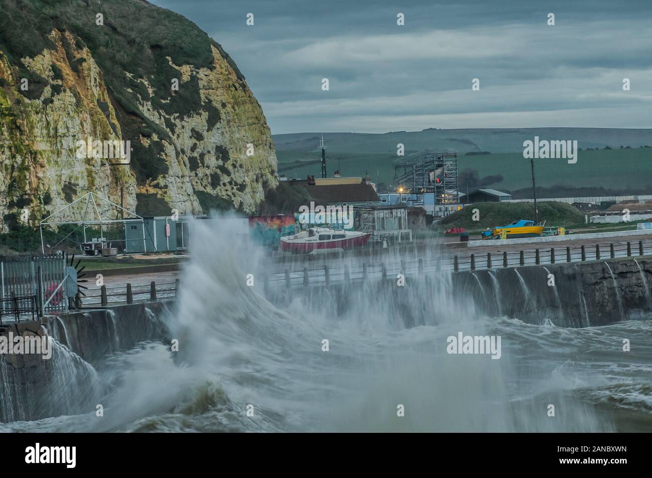 Newhaven, East Sussex, UK..16th January 2019..Increasing Southerly wind toward the end of the day funnels waves into the harbour entrance at West beach. Very heavy rain & more wind is approaching from the West increasing the flood risk along the South coast. David Burr/Alamy Live News. Stock Photo