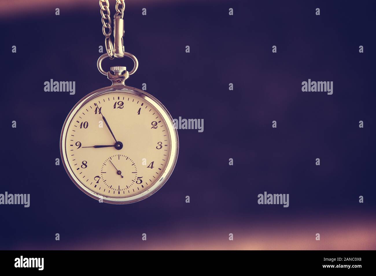 Time Passing Concept. Old Pocket Watch. Deadline, Running Out of Time and Urgency. Stock Photo
