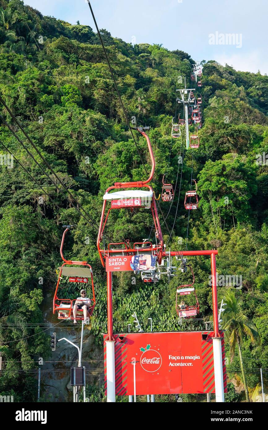 Sao Vicente - SP, Brazil - November 21, 2019: Chairlift of Sao Vicente at Praia do Itarare beach.  Going up the hill above the atlantic forest on a ch Stock Photo