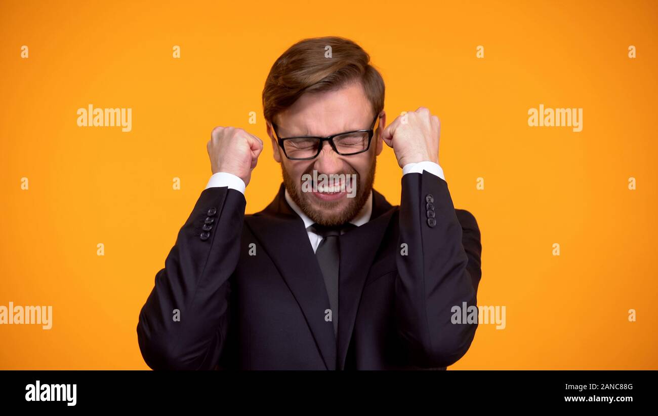 Extremely happy man showing yes hi-res stock photography and images - Alamy